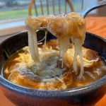 Onions are sauteed, doused in broth and then topped off with cheese and bread in this recipe for French Onion Soup. (Photo by Tressa Dale/Peninsula Clarion)