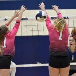 Soldotnas Katelyn Morrison attacks on Kenai Centrals Grace Beiser and Emma Beck on Tuesday, Oct. 25, 2022, at Soldotna High School in Soldotna, Alaska. (Photo by Jeff Helminiak/Peninsula Clarion)