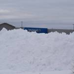 A pile of snow is seen in the Walmart parking lot on Wednesday, Oct. 26, 2022. (Jake Dye/Peninsula Clarion)