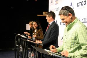 Candidates for Alaskas sole U.S. House seat share a laugh before a debate Wednesday, Oct. 26, 2022, in Anchorage, Alaska. From left are Republican Sarah Palin, U.S. Rep. Mary Peltola, a Democrat; Republican Nick Begich, and Chris Bye, a Libertarian. (AP Photo/Mark Thiessen)