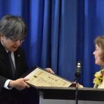 Consular Masaru Aniya bestows Yasuko Lehtinen with the Foreign Minister Commendation on Friday, Oct. 28, 2022, at Kenai Peninsula College in Soldotna, Alaska. (Jake Dye/Peninsula Clarion)
