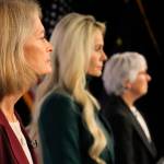 United States Sen. Lisa Murkowski, left, a Republican, looks on Thursday, Oct. 27, 2022, prior to a U.S. Senate debate in Anchorage, Alaska. She faces Republican Kelly Tshibaka, center, and Democrat Pat Chesbro, right, in the general election. (AP Photo/Mark Thiessen)