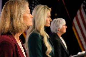 United States Sen. Lisa Murkowski, left, a Republican, looks on Thursday, Oct. 27, 2022, prior to a U.S. Senate debate in Anchorage, Alaska. She faces Republican Kelly Tshibaka, center, and Democrat Pat Chesbro, right, in the general election. (AP Photo/Mark Thiessen)