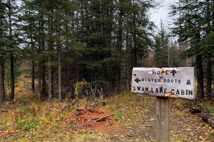 Signage points the way to the Swan Lake Cabin in the Chugach National Forest on Saturday, Oct. 1, 2022, near Cooper Landing, Alaska. (Ashlyn OHara/Peninsula Clarion)
