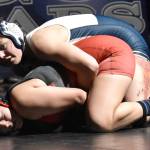 Soldotnas Trinity Donovan works to a pin of Kenai Centrals Jenna Yeoman at 152 pounds Tuesday, Nov. 1, 2022, at Soldotna High School in Soldotna, Alaska. (Photo by Jeff Helminiak/Peninsula Clarion)