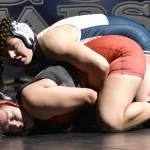 Soldotna's Trinity Donovan works to a pin of Kenai Central's Jenna Yeoman at 152 pounds Tuesday, Nov. 1, 2022, at Soldotna High School in Soldotna, Alaska. (Photo by Jeff Helminiak/Peninsula Clarion)