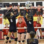 Kenai Centrals Cali Holmes (3) watches her spike get past Nikiskis Alexa Iyatunguk and Savanna Stock on Thursday, Nov. 3, 2022, at the Southcentral Conference volleyball tournament at Kenai Central High School in Kenai, Alaska. (Photo by Jeff Helminiak/Peninsula Clarion)