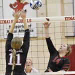Houstons Alycen Hunter attacks on Kenai Centrals Grace Beiser on Friday, Nov. 4, 2022, at the Southcentral Conference volleyball tournament at Kenai Central High School in Kenai, Alaska. (Photo by Jeff Helminiak/Peninsula Clarion)