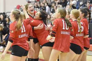 Kenai Central celebrates winning the championship Saturday, Nov. 5, 2022, at the Southcentral Conference volleyball tournament at Kenai Central High School in Kenai, Alaska. (Photo by Jeff Helminiak/Peninsula Clarion)