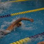 Bengimin Ambrosiani swims the 100-yard freestyle during finals at the ASAA State Swim & Dive Championships on Saturday, Nov. 5, 2022, at Bartlett High School in Anchorage, Alaska. (Jake Dye/Peninsula Clarion)