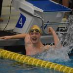 Sewards Paxton Hill celebrates after the 200-yard freestyle relay during finals at the ASAA State Swim & Dive Championships on Saturday, Nov. 5, 2022, at Bartlett High School in Anchorage, Alaska. Seward won the relay, the first relay title claimed by the school in program history. (Jake Dye/Peninsula Clarion)