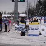 Candidate Ron Gillham, supporters of Gillham and other candidates and a slew of political signage are seen on Election Day, Nov. 8, 2022, at the intersection of the Kenai Spur Highway and Bridge Access Road in Kenai, Alaska. (Jake Dye/Peninsula Clarion)
