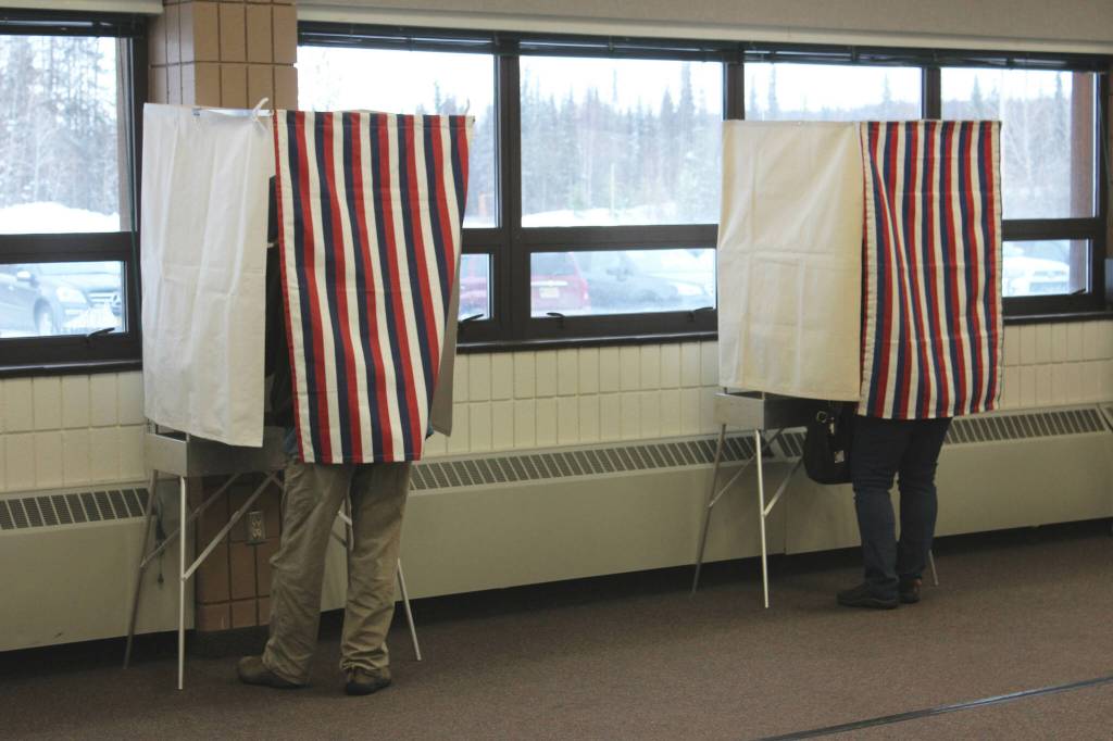 People vote in polling booths at the Soldotna Regional Sports Complex on Tuesday, Nov. 8, 2022 in Soldotna, Alaska. (Ashlyn OHara/Peninsula Clarion)
