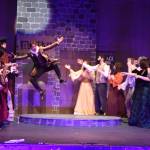 Jerry Nash, as William Shakespeare, makes his entrance during the opening of Something Rotten in a rehearsal on Wednesday, Nov. 9, 2022, at Soldotna High School in Soldotna, Alaska. (Jake Dye/Peninsula Clarion)