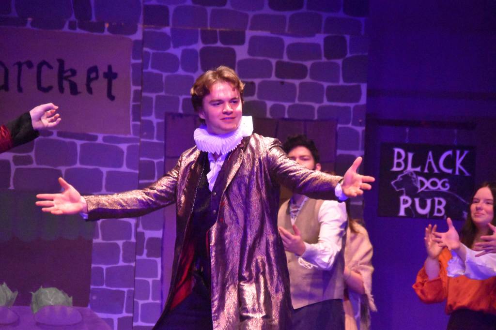 Jerry Nash portrays William Shakespeare in a rehearsal of Something Rotten on Wednesday, Nov. 9, 2022, at Soldotna High School in Soldotna, Alaska. (Jake Dye/Peninsula Clarion)