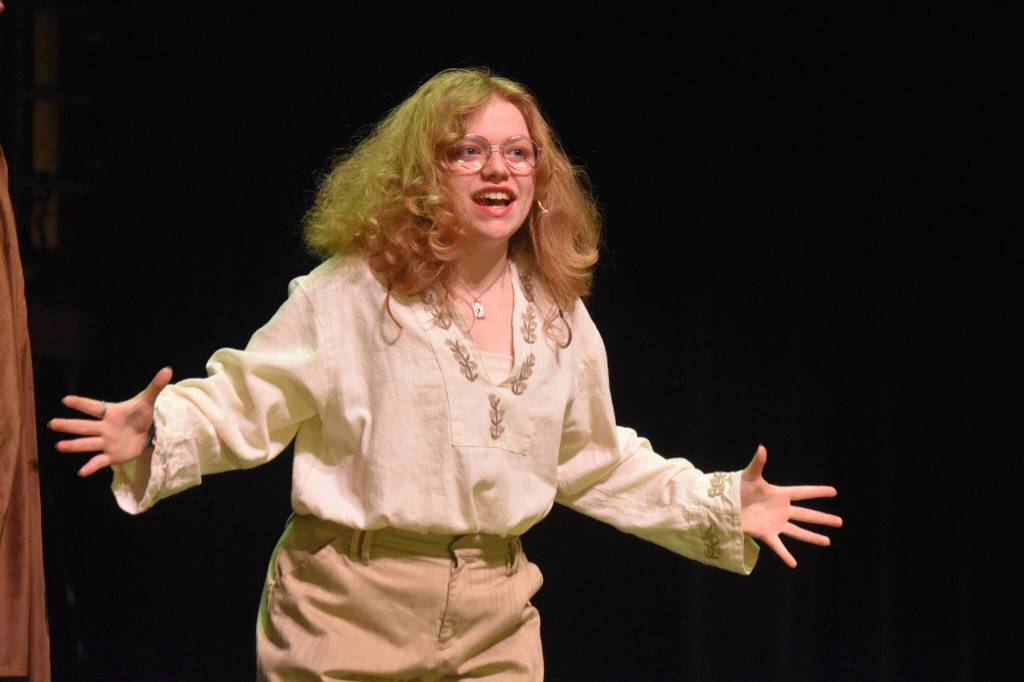Jaylee Webster portrays Thomas Nostradamus in a rehearsal of Something Rotten on Wednesday, Nov. 9, 2022, at Soldotna High School in Soldotna, Alaska. (Jake Dye/Peninsula Clarion)