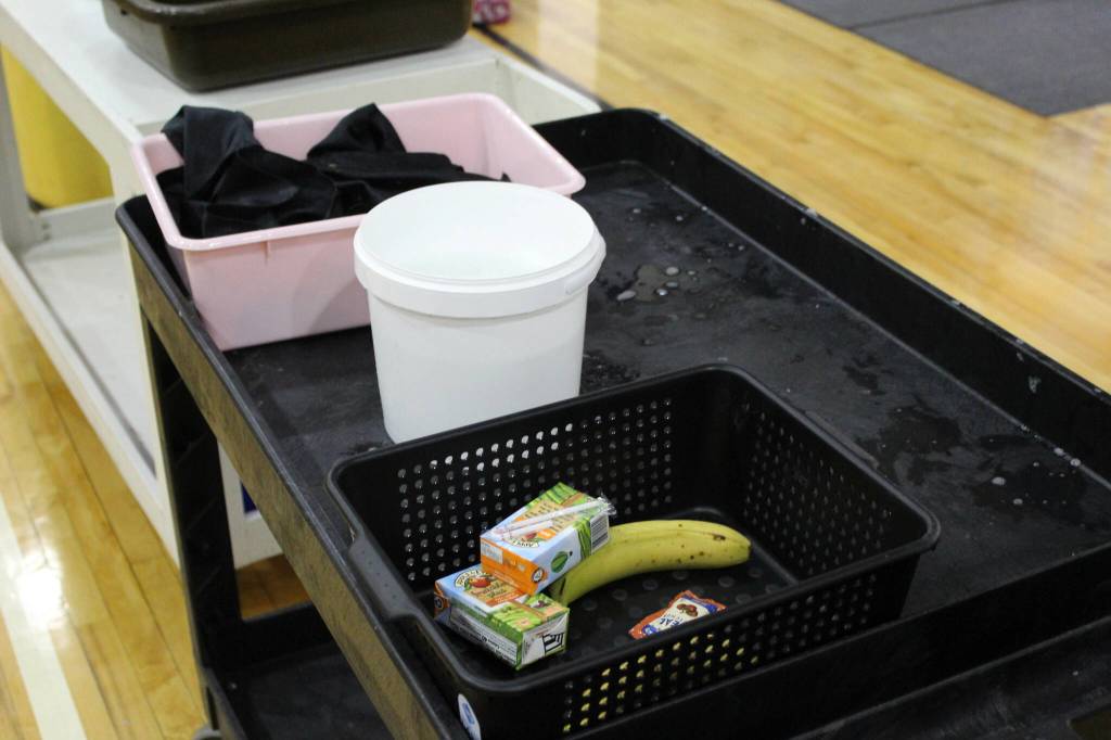 Containers collect used napkins, metal sports and leftover food items at Sterling Elementary School on Thursday, Nov. 10, 2022, in Sterling, Alaska. (Ashlyn OHara/Peninsula Clarion)