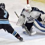 Soldotna goalie Jackson Purcell makes a save on Chugiaks Barrett Pelant on Friday, Nov. 18, 2022, at the Soldotna Regional Sports Complex in Soldotna, Alaska. (Photo by Jeff Helminiak/Peninsula Clarion)