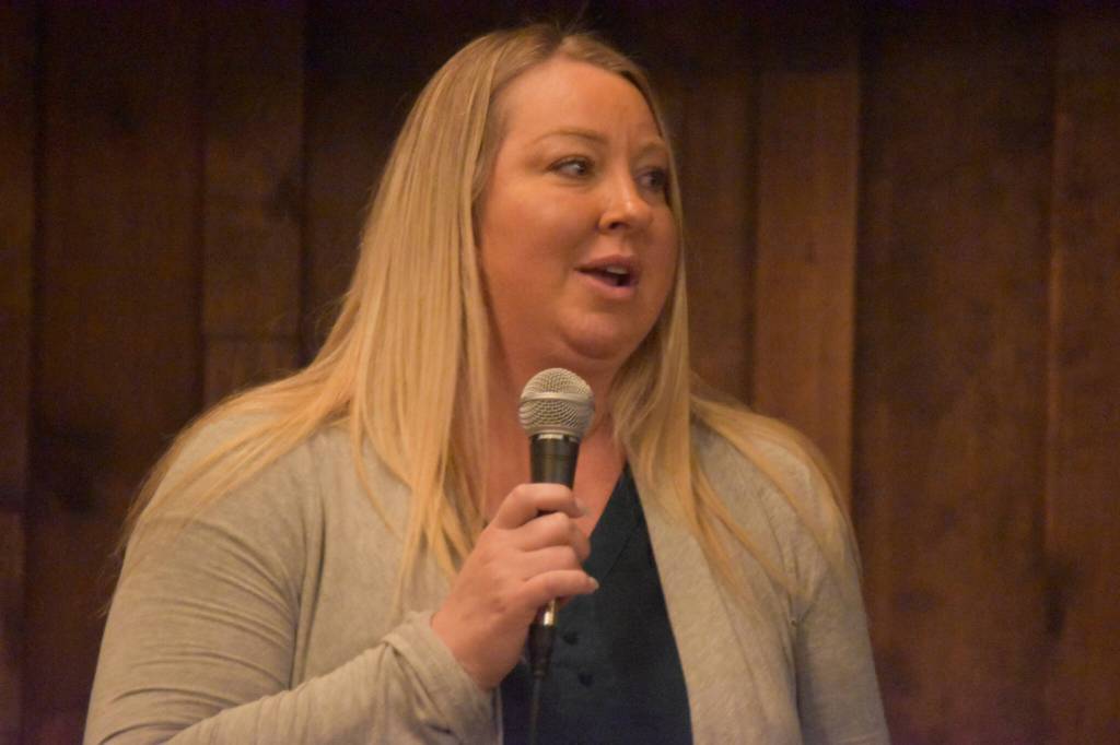 Jill Schaefer, one of the sharks, speaks before announcing the winner of the Spark Soldotna Shark Tank Event on Friday, Nov. 18, 2022, at The Lone Moose Lodge in Soldotna, Alaska. (Jake Dye/Peninsula Clarion)