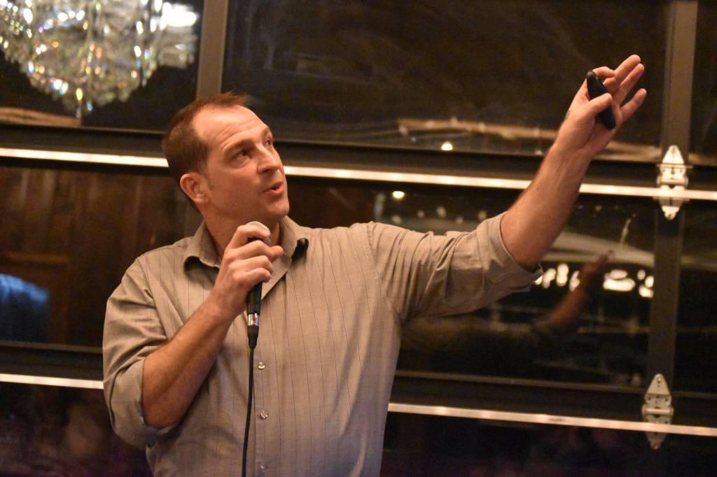 Richard C. Rogers presents his proposal to the sharks at the Spark Soldotna Shark Tank Event on Friday, Nov. 18, 2022, at The Lone Moose Lodge in Soldotna, Alaska. (Jake Dye/Peninsula Clarion)