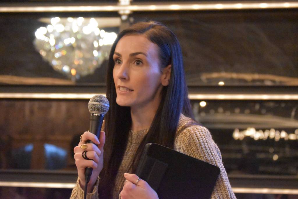 JaNae Saltzgiver presents her proposal to the sharks at the Spark Soldotna Shark Tank Event on Friday, Nov. 18, 2022, at The Lone Moose Lodge in Soldotna, Alaska. (Jake Dye/Peninsula Clarion)