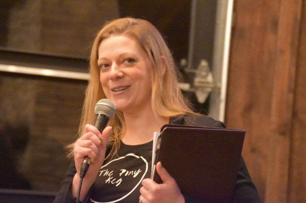 Anna Mercier presents her proposal to the sharks at the Spark Soldotna Shark Tank Event on Friday, Nov. 18, 2022, at The Lone Moose Lodge in Soldotna, Alaska. (Jake Dye/Peninsula Clarion)