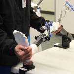 Dr. Michael Reyes manipulates a model leg during a demonstration of ROSA at Central Peninsula Hospital on Monday, Nov. 21, 2022, in Soldotna, Alaska. (Ashlyn OHara/Peninsula Clarion)