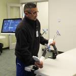 Dr. Michael Reyes manipulates a model knee during a demonstration of ROSA at Central Peninsula Hospital on Monday, Nov. 21, 2022, in Soldotna, Alaska. (Ashlyn OHara/Peninsula Clarion)