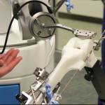 Dr. Michael Reyes manipulates ROSA during a demonstration at Central Peninsula Hospital on Monday, Nov. 21, 2022, in Soldotna, Alaska. (Ashlyn OHara/Peninsula Clarion)