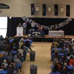 Hundreds of attendees view the induction of Tela ODonnell-Bacher and Neldon Gardner to the National Wrestling Hall of Fame following a duel wrestling meet on Tuesday, Nov. 22, 2022, at Soldotna High School in Soldotna, Alaska. (Jake Dye/Peninsula Clarion)