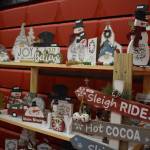 Snowman and Christmas themed crafts are seen ready to be sold at the Kenai Arts & Crafts Fair during early set up at Kenai Central High School in Kenai, Alaska, on Wednesday, Nov. 23, 2022. (Jake Dye/Peninsula Clarion)
