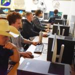 From left, Dain Douthit, Silas Thibodeau, Roman Dunham, Cody Good and Jackson Anding participate in a practice League of Legends match on Tuesday, Nov. 22, 2022 at Kenai Central High School in Kenai, Alaska. (Jake Dye/Peninsula Clarion)
