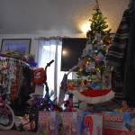 Toys and clothes are displayed, ready to be donated, at the Soldotna Elks Lodge #2706 in Soldotna, Alaska, on Friday, Dec. 2, 2022. (Jake Dye/Peninsula Clarion)