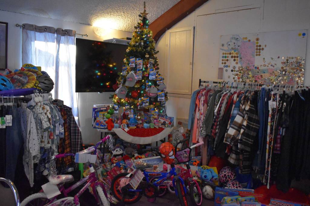 Toys and clothes are displayed, ready to be donated, at the Soldotna Elks Lodge #2706 in Soldotna, Alaska, on Friday, Dec. 2, 2022. (Jake Dye/Peninsula Clarion)
