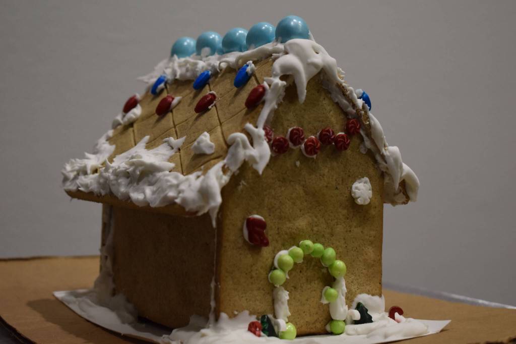 A gingerbread house designed by Kiera Wion-Mooers is seen at the Kenai Chamber of Commerce and Visitor Center on Tuesday, Dec. 6, 2022. (Jake Dye/Peninsula Clarion)