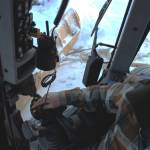 Kenai City Streets foreman Curt Wagoner operates a city grader on Wednesday, Dec. 7, 2022 in Kenai, Alaska. (Ashlyn OHara/Peninsula Clarion)