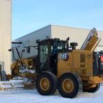 A grader owned by the City of Kenai is parked outside of the city shop on Wednesday, Dec. 7, 2022, in Kenai, Alaska. (Ashlyn OHara/Peninsula Clarion)