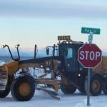 A City of Kenai grader moves snow from roadways in a city subdivision on Wednesday, Dec. 7, 2022, in Kenai, Alaska. (Ashlyn OHara/Peninsula Clarion)
