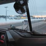 Kenai City Streets foreman Curt Wagoner drives a city sander equipped with a belly blade along the Kenai Spur Highway on Wednesday, Dec. 7, 2022 in Kenai, Alaska. The City of Kenai is not responsible for maintaining state roads. (Ashlyn OHara/Peninsula Clarion)