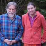 Homer News Editor Michael Armstrong, left, and Senior Reporter Emilie Springer pose for a photo on Tuesday, Dec. 6, 2022, at the paper offices in Homer, Alaska. (Photo by Charlie Menke/Homer News)