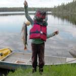 My daughter with our catch of one char (the largest fish) and two trout at Drake Lake, June 17, 2012. (Photo by Matt Bowser)