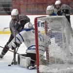 Soldotnas Boone Theiler pushes a shot wide on Palmer goalie Keagon OBryan on Thursday, Dec. 8, 2022, at the Soldotna Regional Sports Complex in Soldotna, Alaska. (Photo by Jeff Helminiak/Peninsula Clarion)