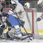 Palmers Elijah Von Gunten attacks the Soldotna net in front of defensemen Aiden Stinnett and Aiden Burcham and goalie Jackson Purcell on Thursday, Dec. 8, 2022, at the Soldotna Regional Sports Complex in Soldotna, Alaska. (Photo by Jeff Helminiak/Peninsula Clarion)