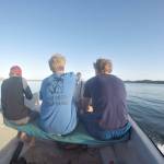 Riding out to explore a barrier reef. (Photo by Mark Laker/USFWS)