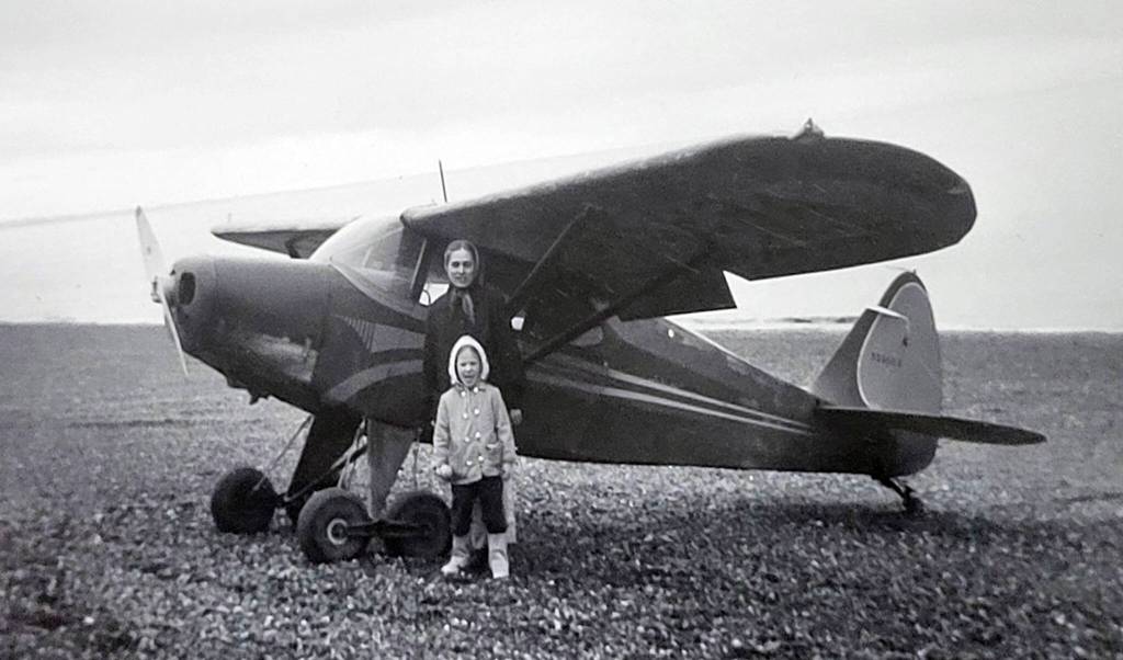 Marian and Grace Goble pose near Ben Gobles airplane near Kenai, circa 1959-60. (Photo courtesy of Ben and Marian Goble)