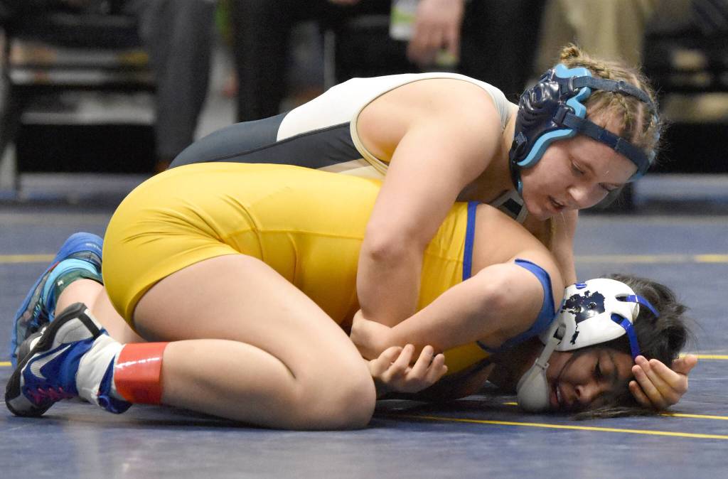 Soldotnas Daisy Hannevold loses the Girls state title match at 138 pounds to Bethels Isabel Lieb on Saturday, Dec. 18, 2022, at the state wrestling tournament at the Alaska Airlines Center in Anchorage, Alaska. (Photo by Jeff Helminiak/Peninsula Clarion)