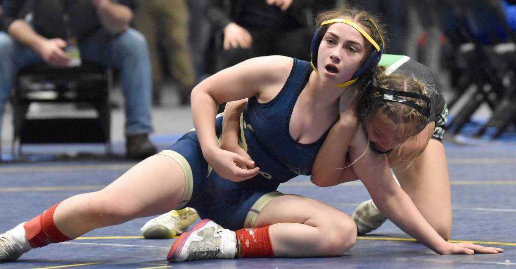 Homers Saoirse Cook defeats Colonys Bayleigh Harrington for the Girls state title at 126 pounds Saturday, Dec. 18, 2022, at the state wrestling tournament at the Alaska Airlines Center in Anchorage, Alaska. (Photo by Jeff Helminiak/Peninsula Clarion)