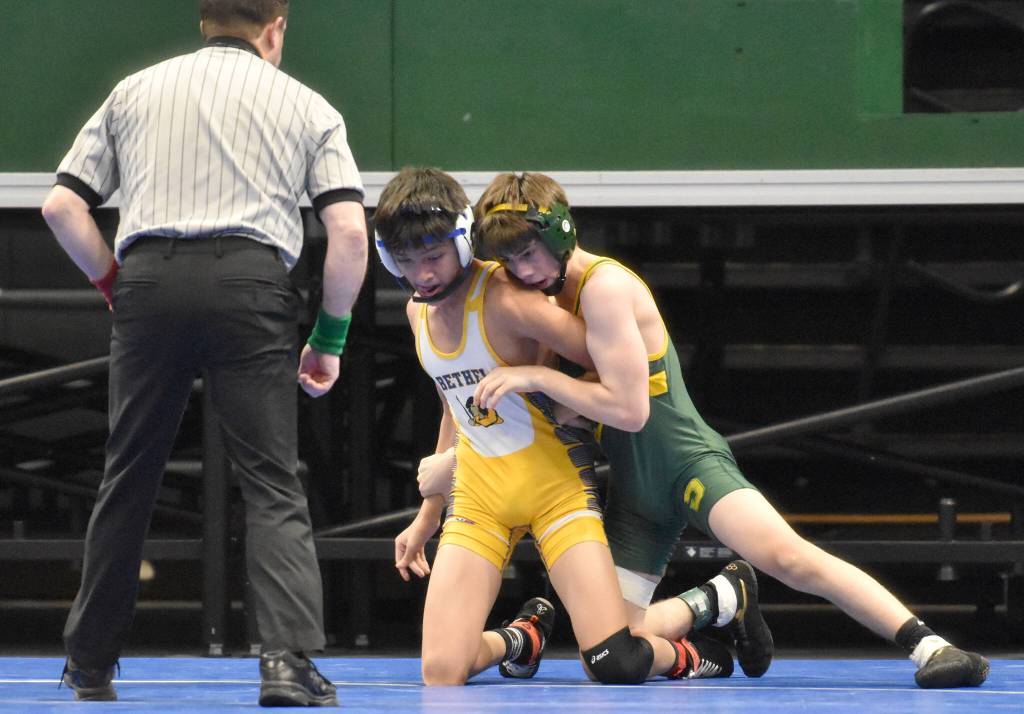 Sewards Aidan Schilling defeats Bethels Alvino Vasquez for the Division II state title at 112 pounds Saturday, Dec. 18, 2022, at the state wrestling tournament at the Alaska Airlines Center in Anchorage, Alaska. (Photo by Jeff Helminiak/Peninsula Clarion)
