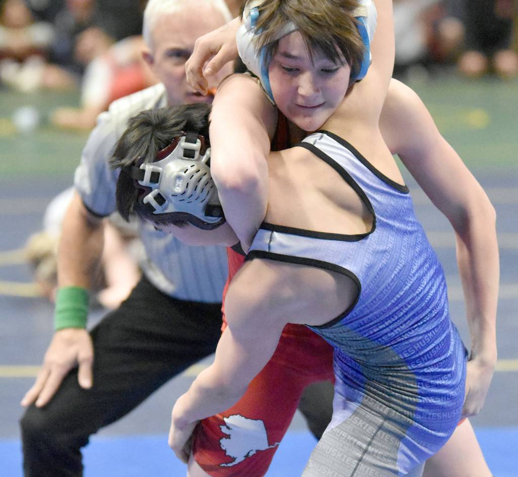 Kenai Centrals Jaxson Young defeats Akiachaks Jason Ekamrak for the Division II state title at 103 pounds Saturday, Dec. 18, 2022, at the state wrestling tournament at the Alaska Airlines Center in Anchorage, Alaska. (Photo by Jeff Helminiak/Peninsula Clarion)