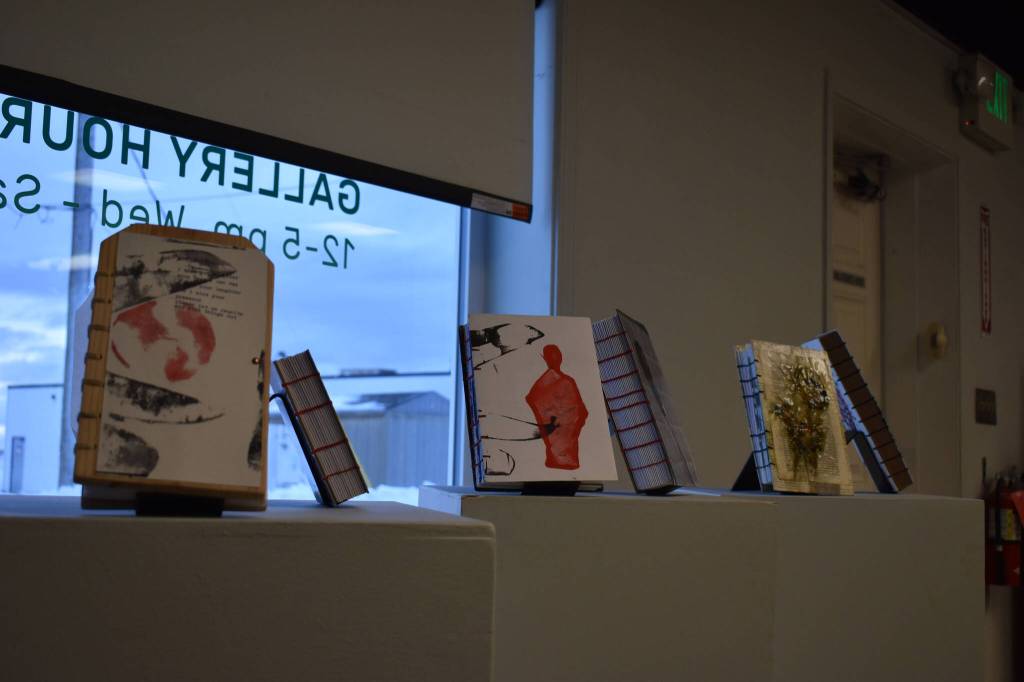 Handmade journals rest on stands on Tuesday, Jan. 3, 2023, ahead of the opening of Diane Dunns 2000 Journals: Filling the Void at the Kenai Art Center in Kenai, Alaska. (Jake Dye/Peninsula Clarion)